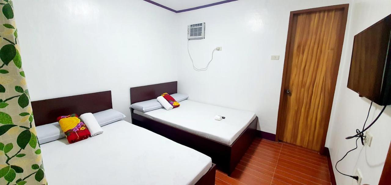 SJ Pabua Travellers Inn Mambajao Esterno foto